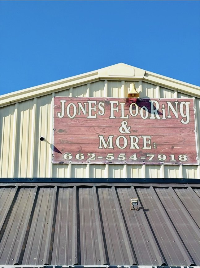 Exterior security camera installed on a local business building